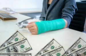 man with an injured hand and dollars at the bottom of the photo