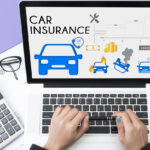 business hand using computer with car insurance policy page. concept accident prevention coverage.